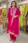 Shop stunning rani pink zaridar silk suit online in USA with dupatta. Shop the best and latest designs in embroidered sarees, designer sarees, Anarkali suit, lehengas, sharara suits for weddings and special occasions from Pure Elegance Indian fashion store in USA.-full view