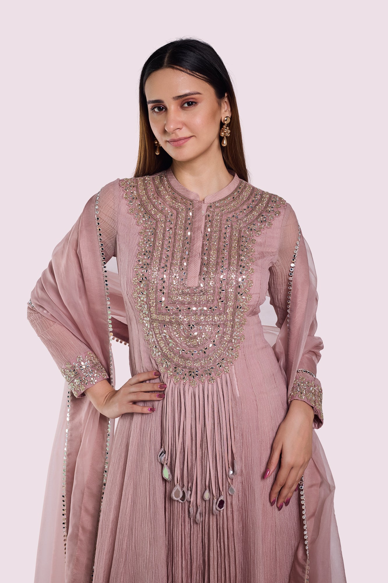 Shop dusty pink embroidered crush fabric Anarkali online in USA with dupatta. Shop the best and latest designs in embroidered sarees, designer sarees, Anarkali suit, lehengas, sharara suits for weddings and special occasions from Pure Elegance Indian fashion store in USA.-closeup