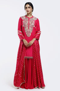 Buy pink embroidered crepe sharara suit online in USA with bandhej dupatta. Shop the best and latest designs in embroidered sarees, designer sarees, Anarkali suit, lehengas, sharara suits for weddings and special occasions from Pure Elegance Indian fashion store in USA.-full view