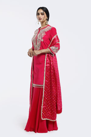 Buy pink embroidered crepe sharara suit online in USA with bandhej dupatta. Shop the best and latest designs in embroidered sarees, designer sarees, Anarkali suit, lehengas, sharara suits for weddings and special occasions from Pure Elegance Indian fashion store in USA.-side