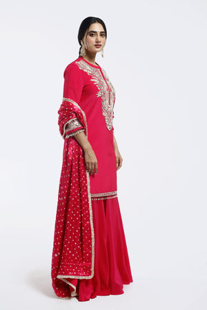 Buy pink embroidered crepe sharara suit online in USA with bandhej dupatta. Shop the best and latest designs in embroidered sarees, designer sarees, Anarkali suit, lehengas, sharara suits for weddings and special occasions from Pure Elegance Indian fashion store in USA.-suit