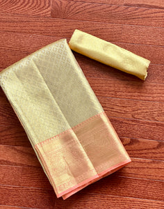 Buy cream Kanjivaram silk saree online in USA with peach zari border. Look your best on festive occasions in latest designer sarees, pure silk sarees, Kanjivaram silk saris, handwoven saris, tussar silk sarees, embroidered saris from Pure Elegance Indian clothing store in USA.-full view