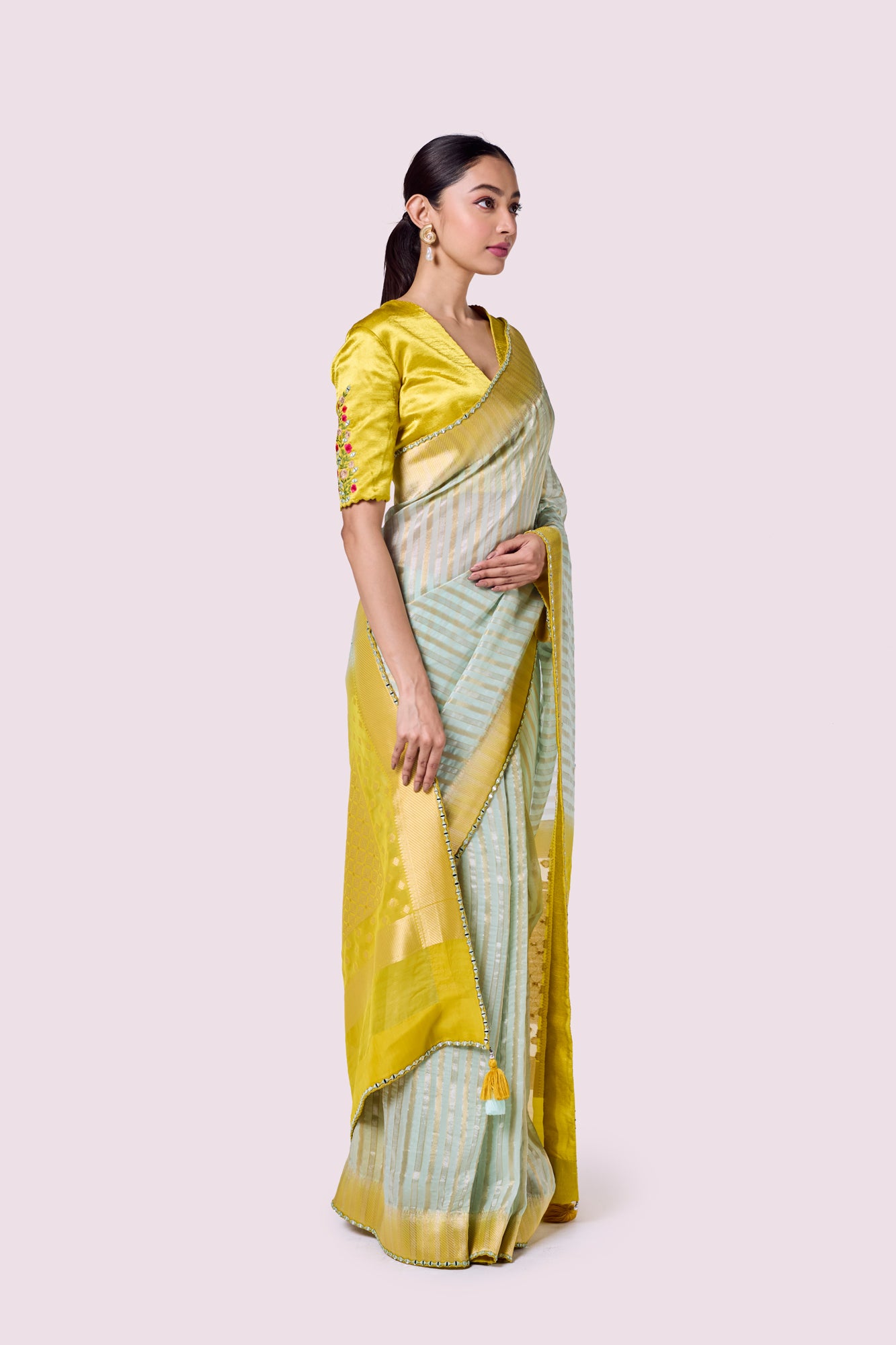 Buy aqua and mustard organza saree online in USA with mashru silk saree blouse. Look your best at parties and weddings in beautiful designer sarees, embroidered sarees, handwoven sarees, silk sarees, organza saris from Pure Elegance Indian saree store in USA.-side