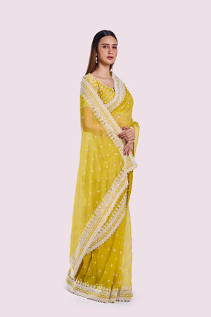 Buy yellow embroidered organza saree online in USA with blouse. Look your best at parties and weddings in beautiful designer sarees, embroidered sarees, handwoven sarees, silk sarees, organza saris from Pure Elegance Indian saree store in USA.-side