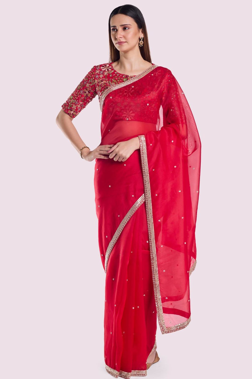 Buy red organza saree online in USA with embroidered blouse. Look your best at parties and weddings in beautiful designer sarees, embroidered sarees, handwoven sarees, silk sarees, organza saris from Pure Elegance Indian saree store in USA.-full view