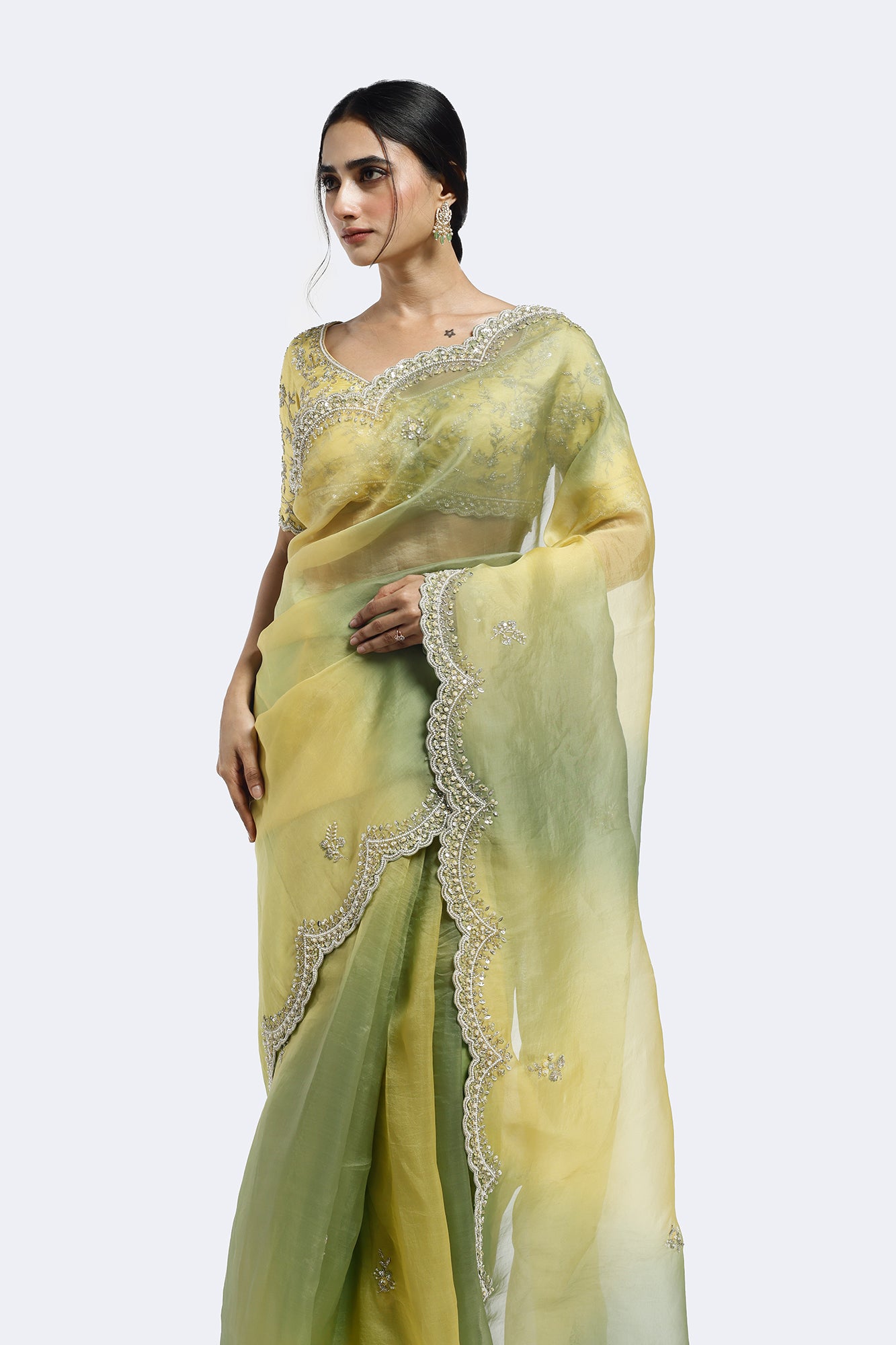 Buy golden and green cutdana gradient organza saree online in USA. Look your best at parties and weddings in beautiful designer sarees, embroidered sarees, handwoven sarees, silk sarees, organza saris from Pure Elegance Indian saree store in USA.-side