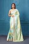 Buy pastel green Mashru Banarasi saree online in USA with embroidery. Look royal at weddings and festive occasions in exquisite designer sarees, handwoven sarees, pure silk saris, Banarasi sarees, Kanchipuram silk sarees from Pure Elegance Indian saree store in USA. -full view