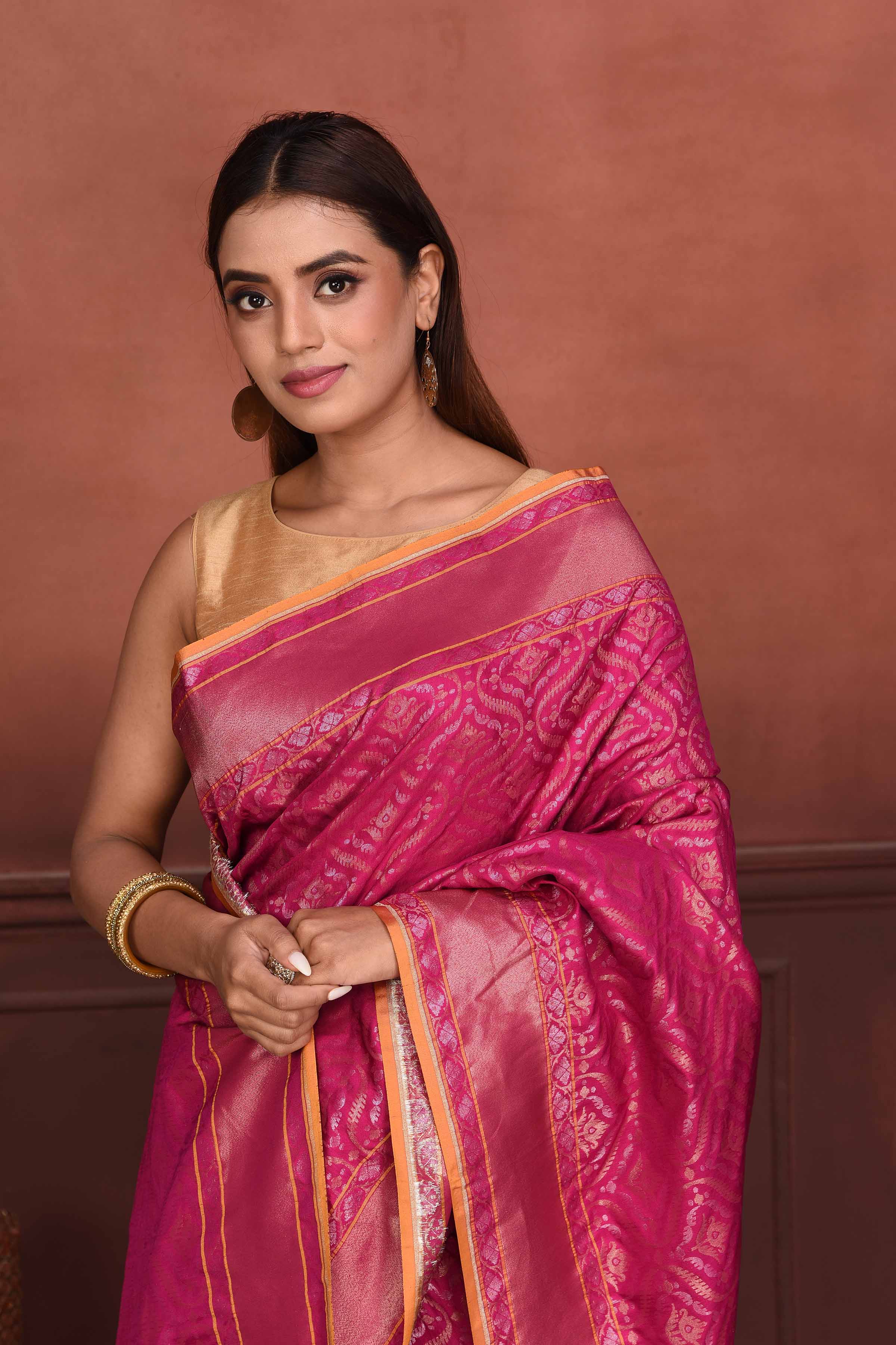 Shop beautiful pink Katan silk Banarasi saree online in USA with zari work. Look your best on festive occasions in latest designer sarees, pure silk saris, Kanchipuram silk sarees, handwoven sarees, tussar silk sarees, embroidered saris from Pure Elegance Indian clothing store in USA.-closeup