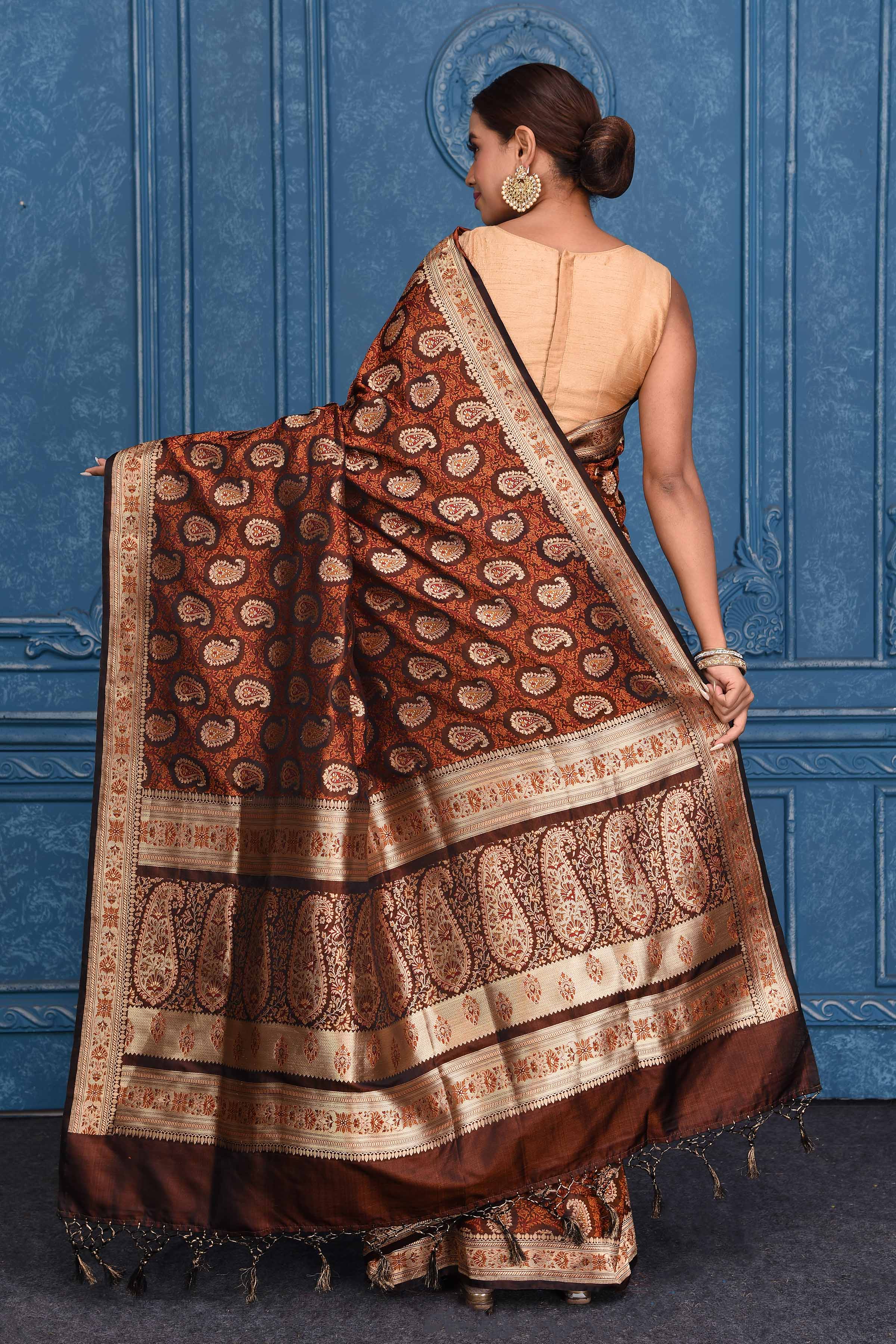 Buy brown Tanchoi silk Banarasi saree online in USA with paisley buta. Look your best on festive occasions in latest designer sarees, pure silk saris, Kanchipuram silk sarees, handwoven sarees, tussar silk sarees, embroidered saris from Pure Elegance Indian clothing store in USA.-back