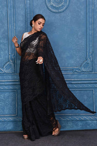 Shop stunning black designer lace saree online in USA. Look royal at weddings and festive occasions in exquisite designer sarees, handwoven sarees, pure silk saris, Banarasi sarees, Kanchipuram silk sarees from Pure Elegance Indian saree store in USA. -full view