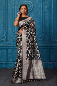 Shop black Banarasi saree online in USA with silver zari minakari work. Look your best on festive occasions in latest designer sarees, pure silk saris, Kanchipuram silk sarees, handwoven sarees, tussar silk sarees, embroidered sarees from Pure Elegance Indian saree store in USA.-full view