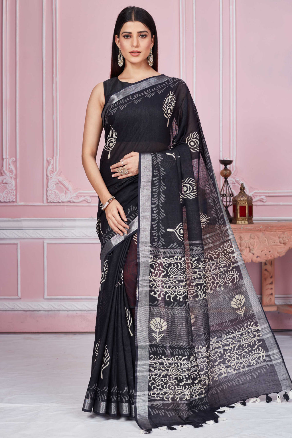 Buy black floral print linen sari online in USA with silver zari border. Look your best on festive occasions in latest designer sarees, pure silk sarees, Kanjivaram silk saris, handwoven saris, tussar silk sarees, embroidered saris from Pure Elegance Indian clothing store in USA.-full view