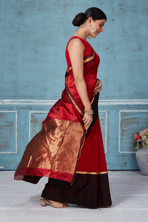 Buy beautiful maroon Pattu silk saree online in USA with black Mashru border. Look your best on festive occasions in latest designer saris, pure silk saris, Kanchipuram silk sarees, handwoven sarees, tussar silk sarees, embroidered sarees from Pure Elegance Indian fashion store in USA.-side