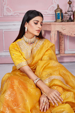 Buy yellow gota patti embroidery organza sari online in USA with blouse. Look your best on festive occasions in latest designer sarees, pure silk sarees, Kanjivaram silk saris, handwoven saris, tussar silk sarees, embroidered saris from Pure Elegance Indian clothing store in USA.-closeup