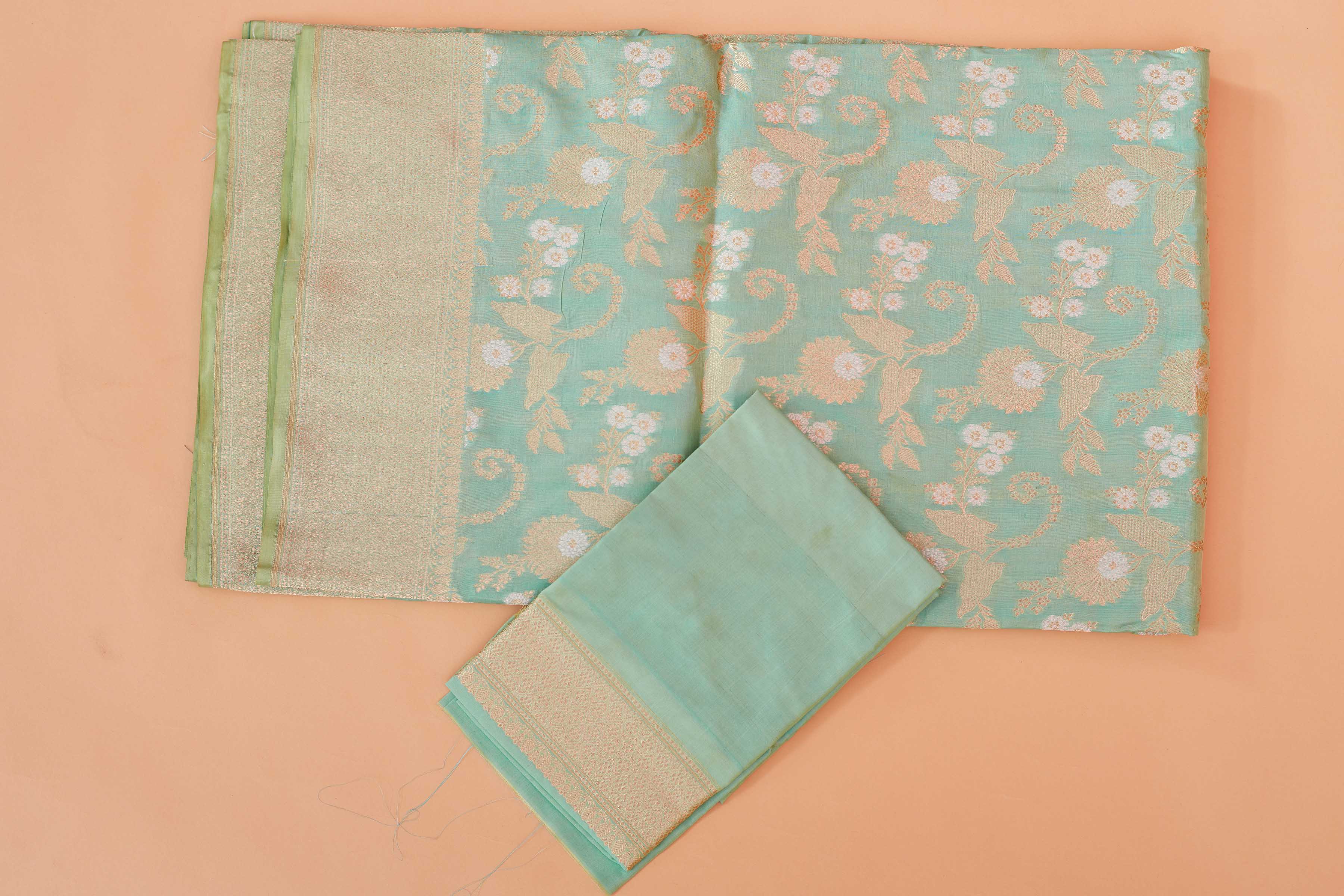 Buy pastel green katan silk Banarasi saree online in USA with zari jaal. Look your best on festive occasions in latest designer saris, pure silk sarees, Kanjivaram silk sarees, handwoven saris, tussar silk sarees, embroidered saris from Pure Elegance Indian clothing store in USA.-blouse