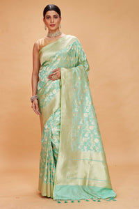 Buy pastel green katan silk Banarasi saree online in USA with zari jaal. Look your best on festive occasions in latest designer saris, pure silk sarees, Kanjivaram silk sarees, handwoven saris, tussar silk sarees, embroidered saris from Pure Elegance Indian clothing store in USA.-full view