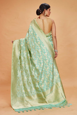 Buy pastel green katan silk Banarasi saree online in USA with zari jaal. Look your best on festive occasions in latest designer saris, pure silk sarees, Kanjivaram silk sarees, handwoven saris, tussar silk sarees, embroidered saris from Pure Elegance Indian clothing store in USA.-back