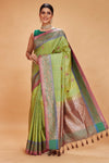 Buy light green tussar Banarasi sari online in USA with green pink zari border. Look your best on festive occasions in latest designer saris, pure silk sarees, Kanjivaram silk sarees, handwoven saris, tussar silk sarees, embroidered saris from Pure Elegance Indian clothing store in USA.-full view