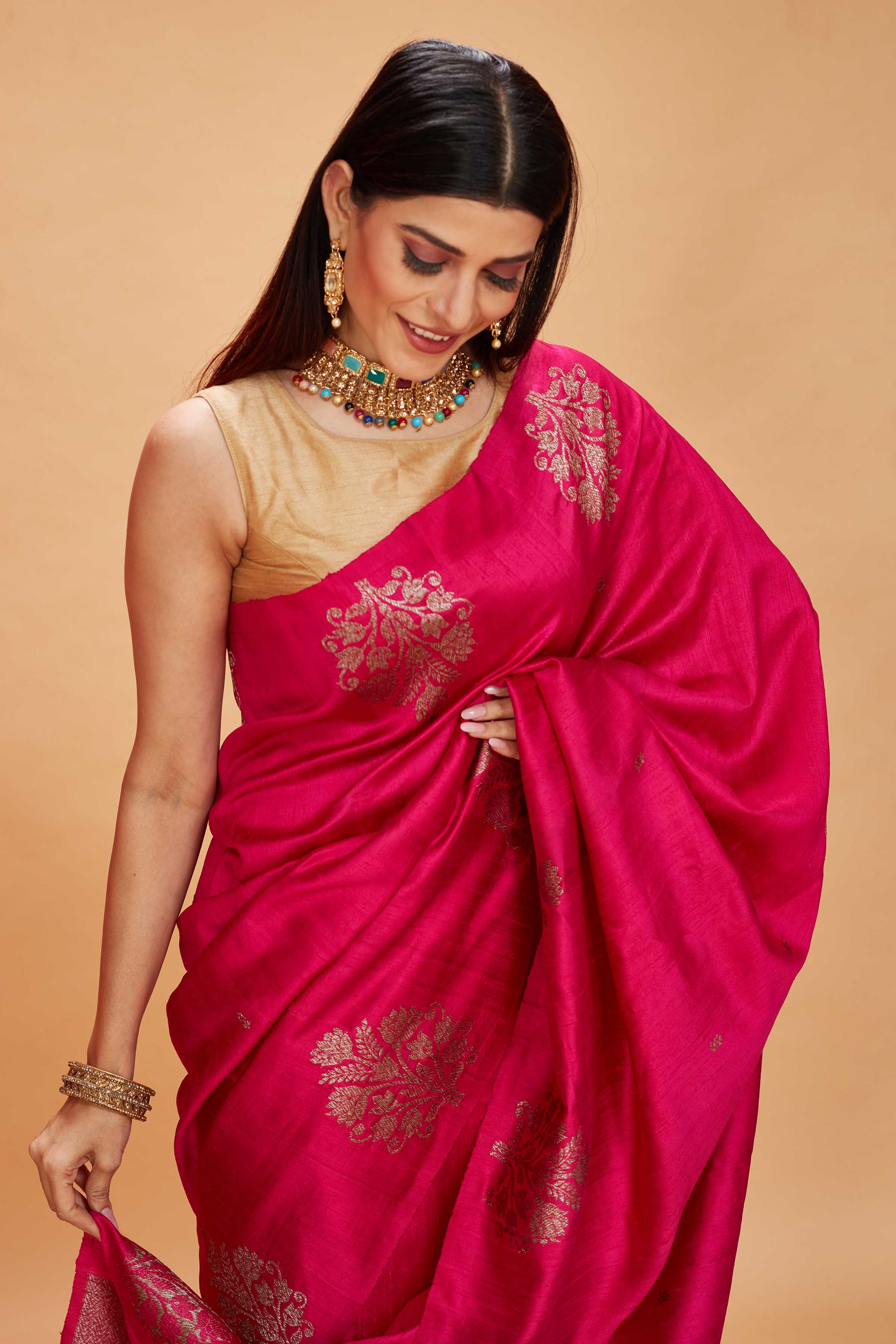  Buy pink tussar Banarasi sari online in USA with floral zari buta. Look your best on festive occasions in latest designer saris, pure silk sarees, Kanjivaram silk sarees, handwoven saris, tussar silk sarees, embroidered saris from Pure Elegance Indian clothing store in USA.-closeup