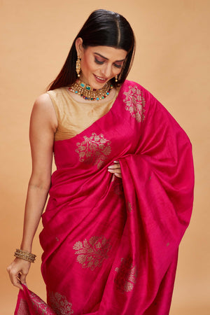  Buy pink tussar Banarasi sari online in USA with floral zari buta. Look your best on festive occasions in latest designer saris, pure silk sarees, Kanjivaram silk sarees, handwoven saris, tussar silk sarees, embroidered saris from Pure Elegance Indian clothing store in USA.-closeup