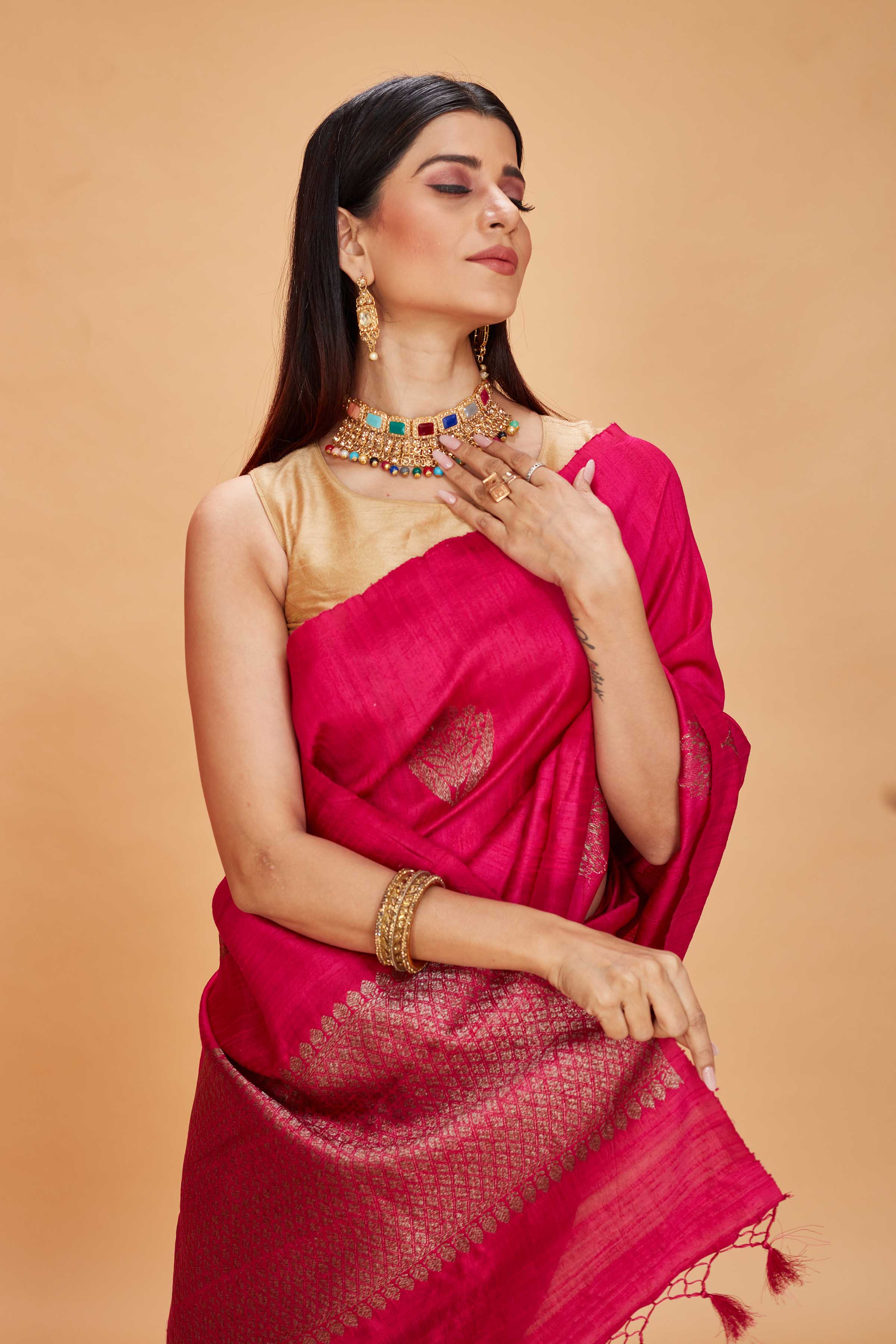 Shop beautiful rani pink tussar Banarasi sari online in USA with antique zari pallu. Look your best on festive occasions in latest designer saris, pure silk sarees, Kanjivaram silk sarees, handwoven saris, tussar silk sarees, embroidered saris from Pure Elegance Indian clothing store in USA.-closeup