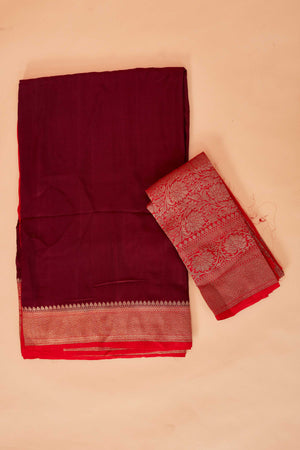 Shop maroon tussar Banarasi saree online in USA with red zari border. Look your best on festive occasions in latest designer saris, pure silk sarees, Kanjivaram silk sarees, handwoven saris, tussar silk sarees, embroidered sarees from Pure Elegance Indian clothing store in USA.-blouse