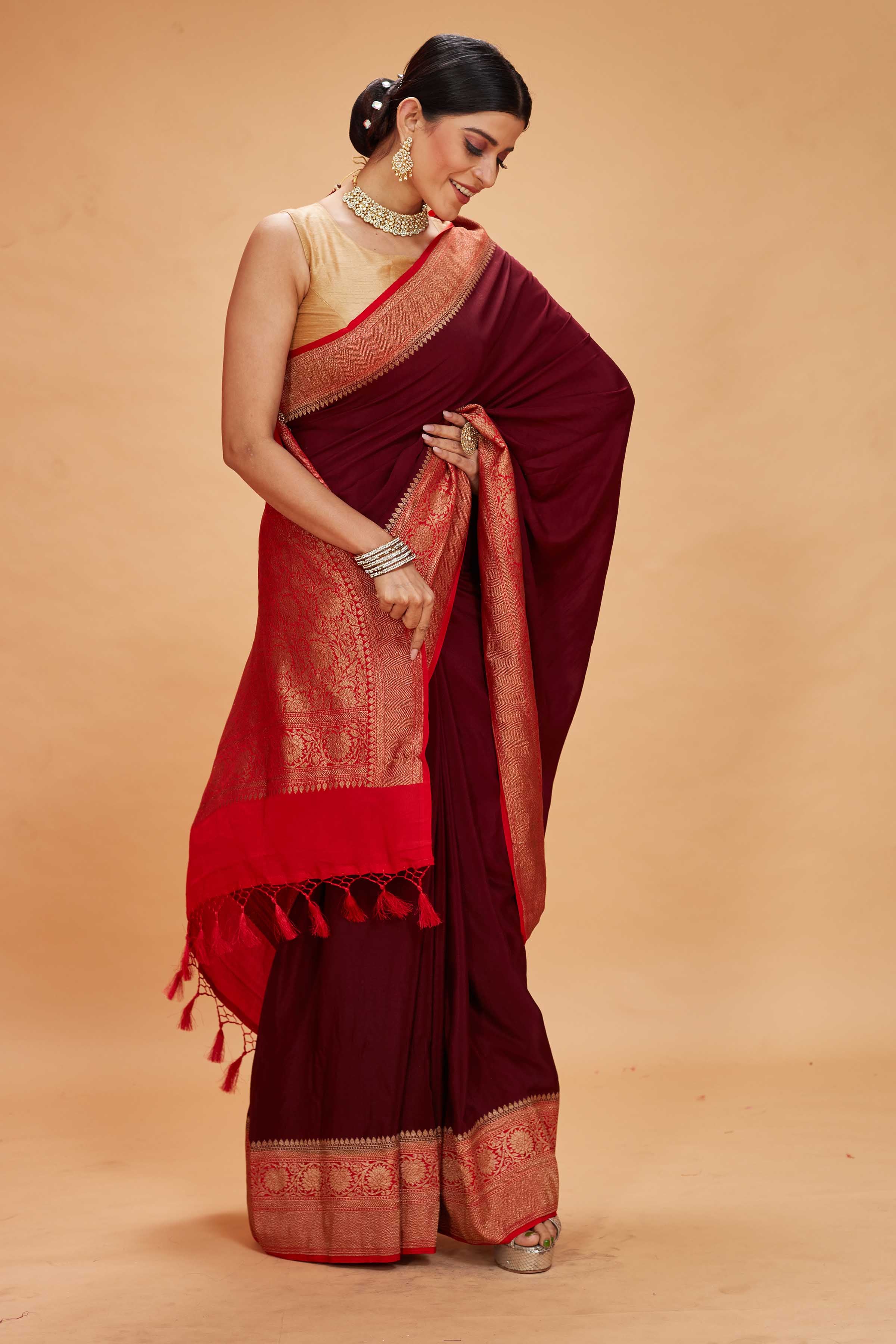 Shop maroon tussar Banarasi saree online in USA with red zari border. Look your best on festive occasions in latest designer saris, pure silk sarees, Kanjivaram silk sarees, handwoven saris, tussar silk sarees, embroidered sarees from Pure Elegance Indian clothing store in USA.-side