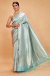 Shop pastel green Katan Banarasi saree online in USA with floral zari jaal. Look your best on festive occasions in latest designer saris, pure silk sarees, Kanjivaram silk sarees, handwoven saris, tussar silk sarees, embroidered sarees from Pure Elegance Indian clothing store in USA.-full view