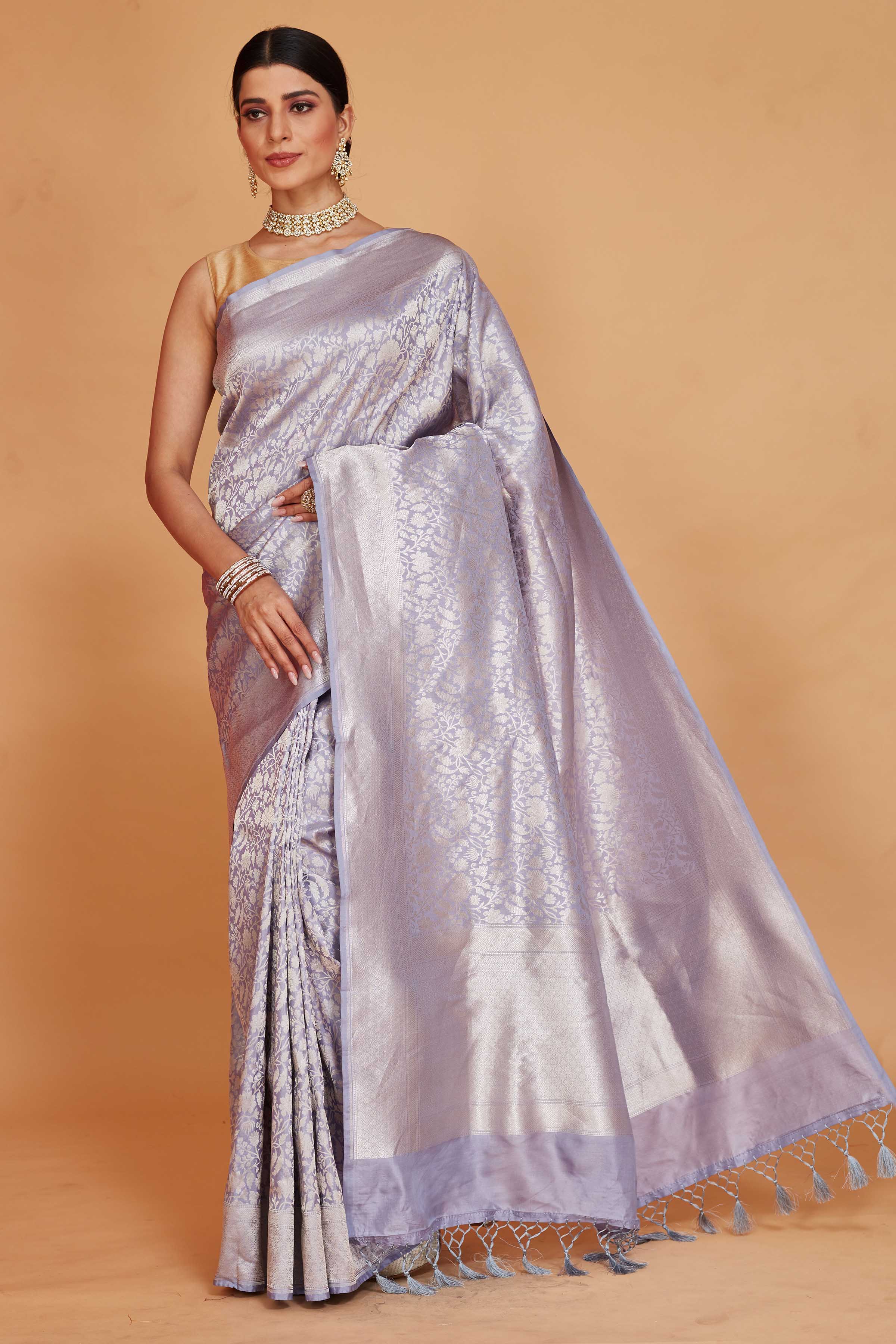 Buy powder blue Katan Banarasi saree online in USA with floral zari jaal. Look your best on festive occasions in latest designer saris, pure silk sarees, Kanjivaram silk sarees, handwoven saris, tussar silk sarees, embroidered sarees from Pure Elegance Indian clothing store in USA.-full view