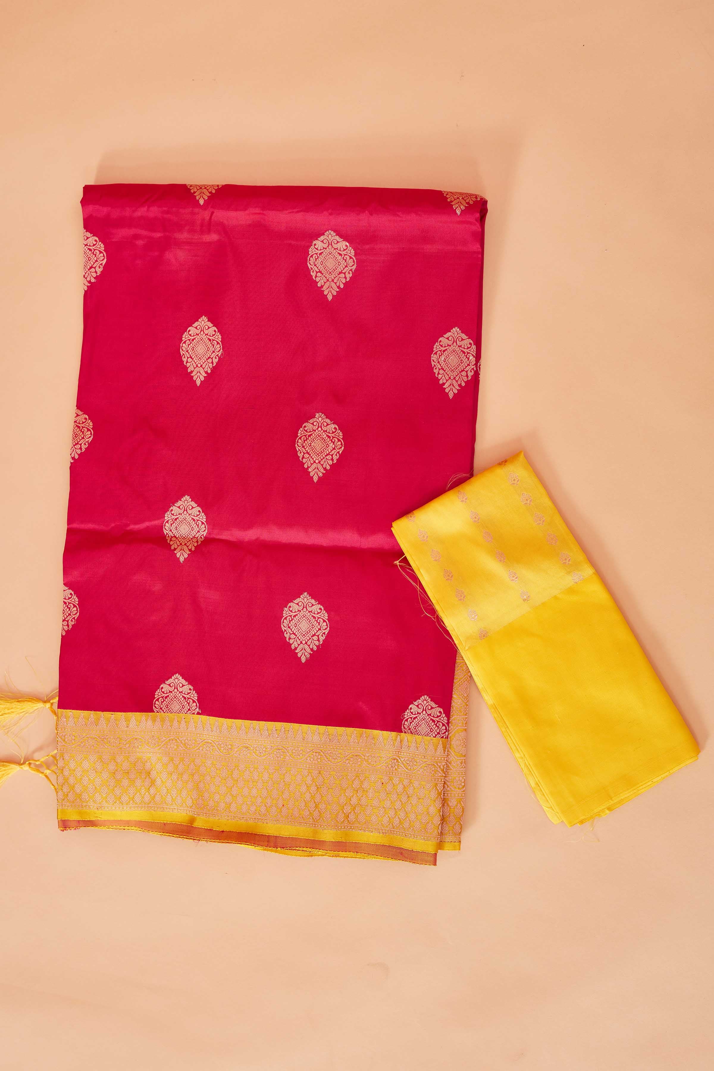 Shop red Katan Banarasi saree online in USA with yellow zari border. Look your best on festive occasions in latest designer saris, pure silk sarees, Kanjivaram silk sarees, handwoven saris, tussar silk sarees, embroidered sarees from Pure Elegance Indian clothing store in USA.-blouse