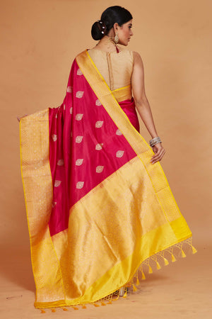 Shop red Katan Banarasi saree online in USA with yellow zari border. Look your best on festive occasions in latest designer saris, pure silk sarees, Kanjivaram silk sarees, handwoven saris, tussar silk sarees, embroidered sarees from Pure Elegance Indian clothing store in USA.-saree