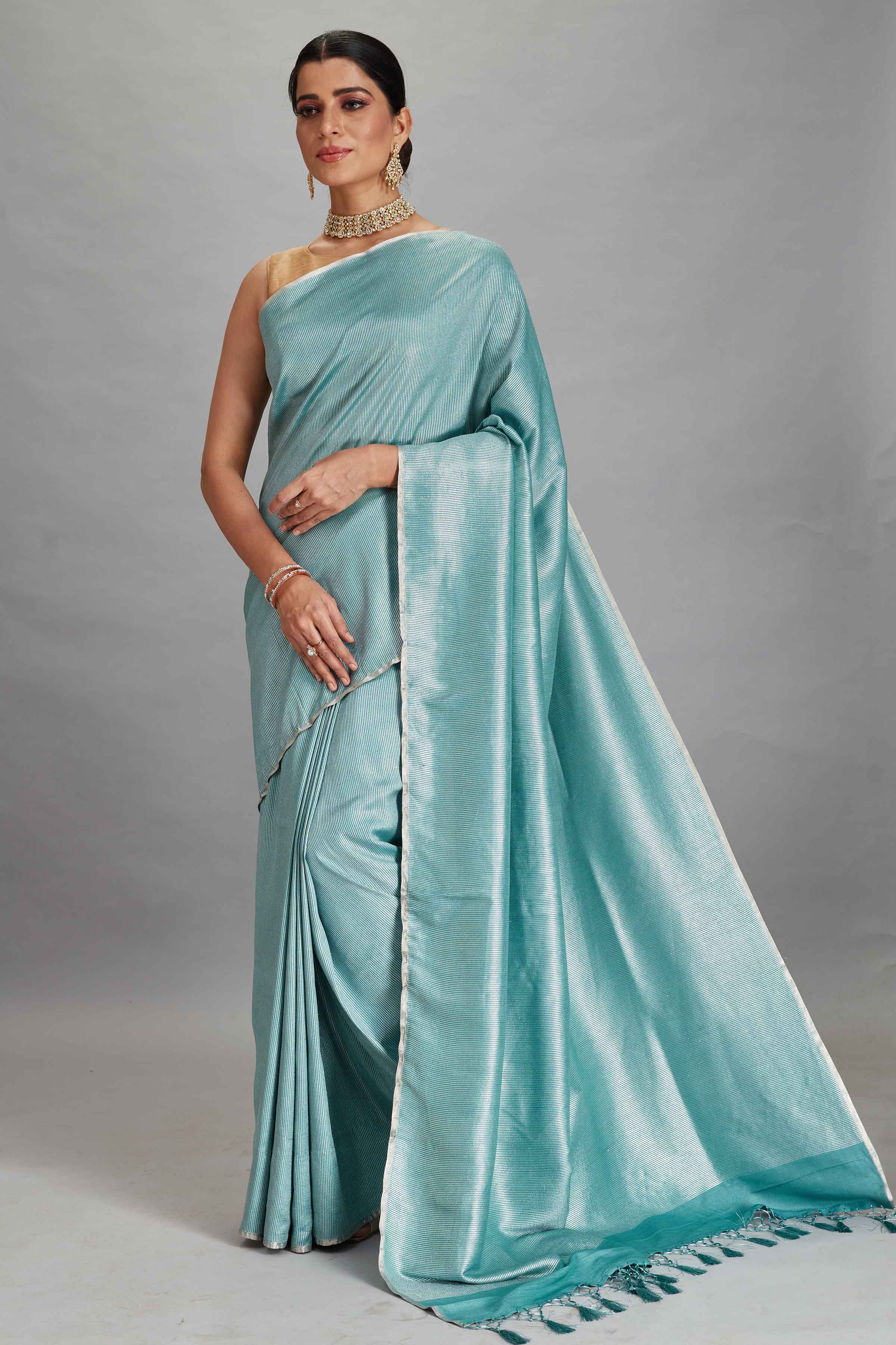 Buy pastel green muga Banarasi saree online in USA with zari stripes. Look your best on festive occasions in latest designer sarees, pure silk sarees, Kanjivaram silk saris, handwoven saris, tussar silk sarees, embroidered saris from Pure Elegance Indian clothing store in USA.-full view