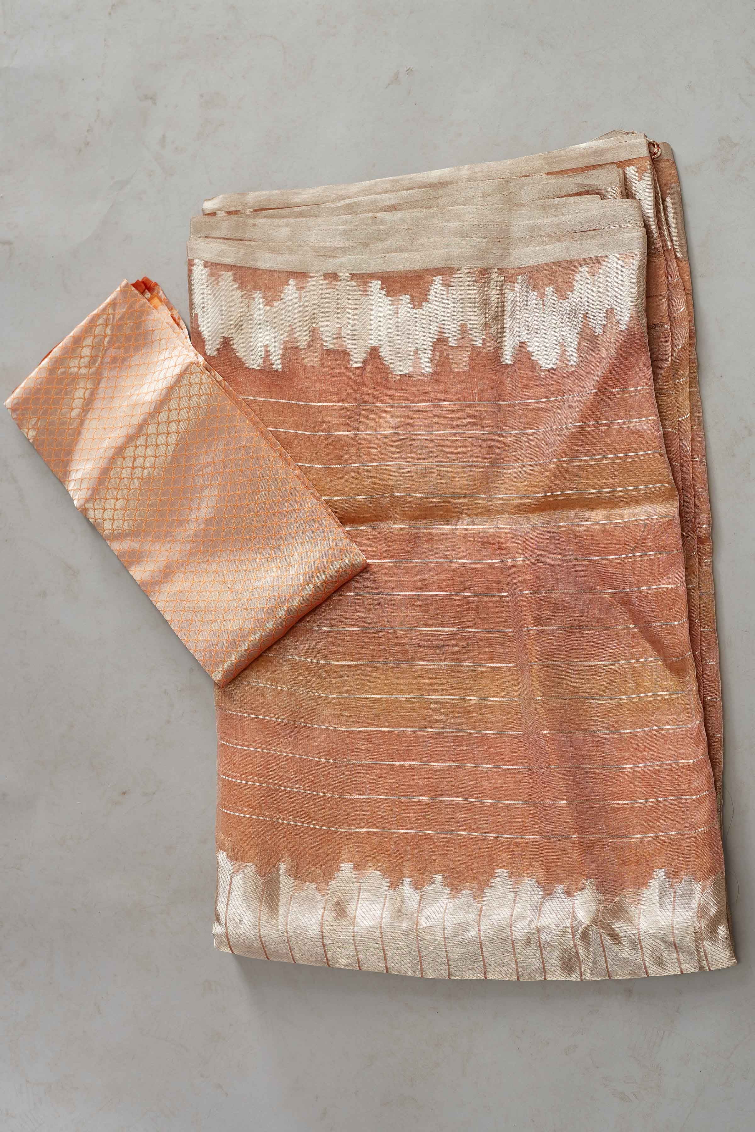 Buy peach striped tissue Banarasi saree online in USA. Look your best on festive occasions in latest designer sarees, pure silk sarees, Kanjivaram silk saris, handwoven saris, tussar silk sarees, embroidered saris from Pure Elegance Indian clothing store in USA.-blouse