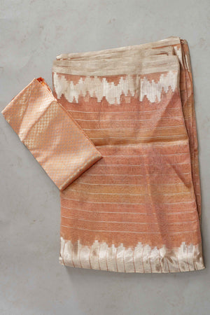 Buy peach striped tissue Banarasi saree online in USA. Look your best on festive occasions in latest designer sarees, pure silk sarees, Kanjivaram silk saris, handwoven saris, tussar silk sarees, embroidered saris from Pure Elegance Indian clothing store in USA.-blouse