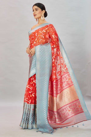 Buy red Kora Banarasi sari online in USA with blue zari border. Look your best on festive occasions in latest designer sarees, pure silk sarees, Kanjivaram silk saris, handwoven saris, tussar silk sarees, embroidered saris from Pure Elegance Indian clothing store in USA.-pallu