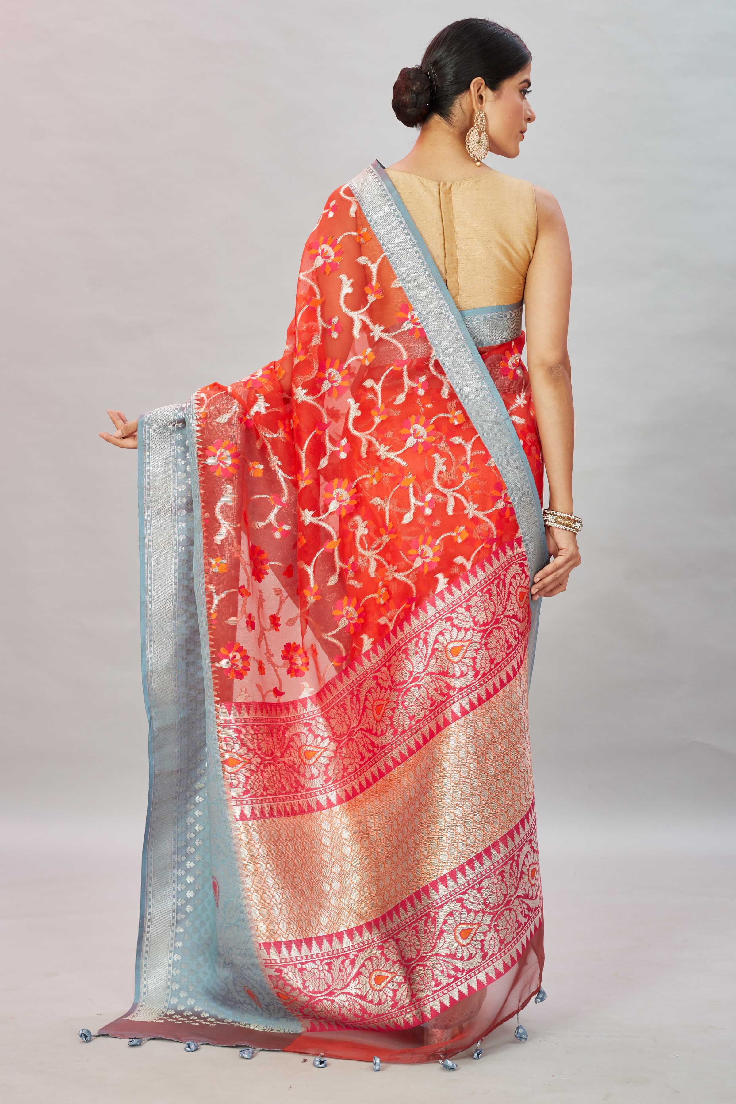 Buy red Kora Banarasi sari online in USA with blue zari border. Look your best on festive occasions in latest designer sarees, pure silk sarees, Kanjivaram silk saris, handwoven saris, tussar silk sarees, embroidered saris from Pure Elegance Indian clothing store in USA.-back