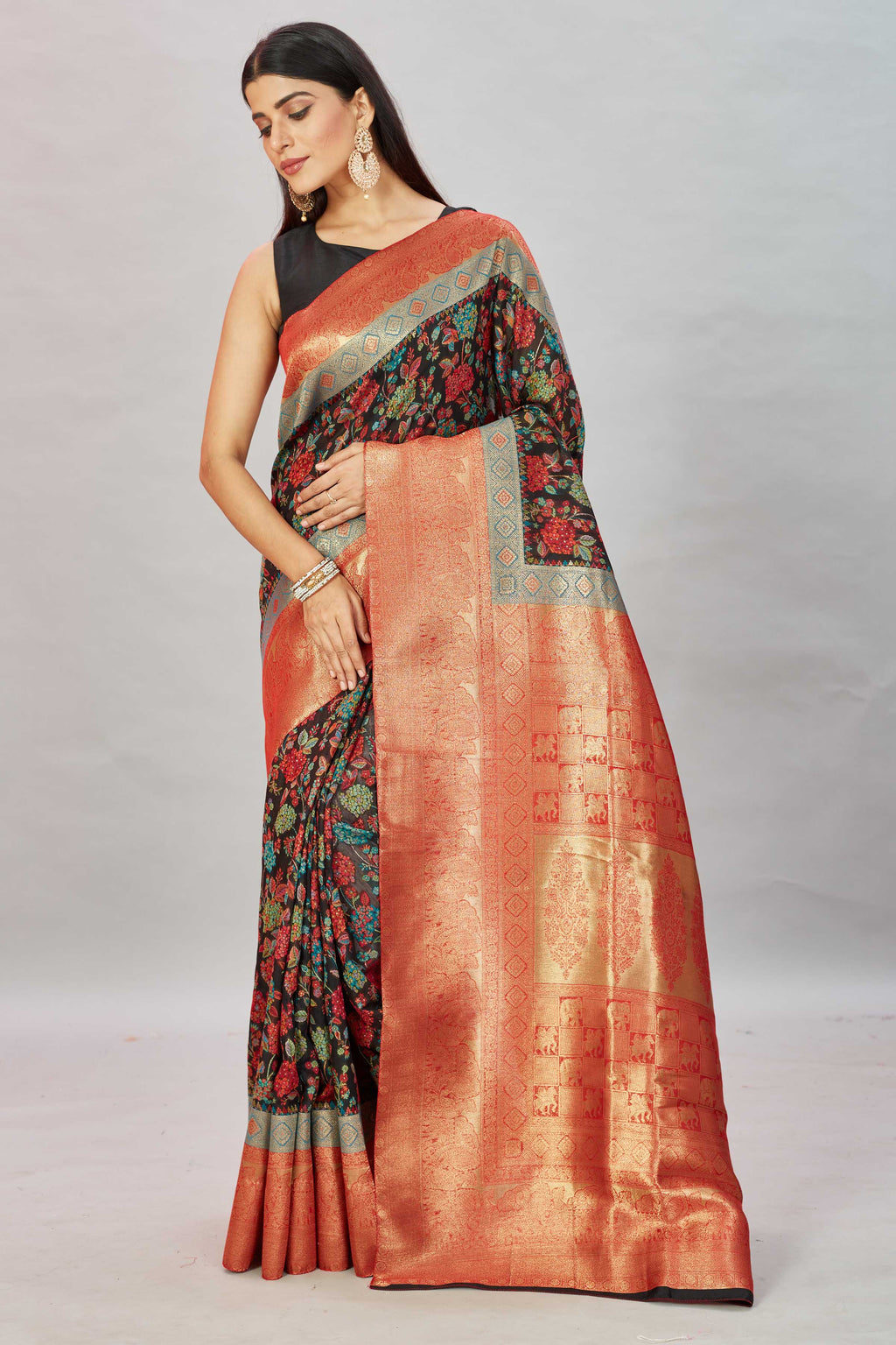 Buy black floral Kani weave sari online in USA with red zari border. Look your best on festive occasions in latest designer sarees, pure silk sarees, Kanjivaram silk sarees, handwoven sarees, tussar silk sarees, embroidered saris from Pure Elegance Indian clothing store in USA.-full view