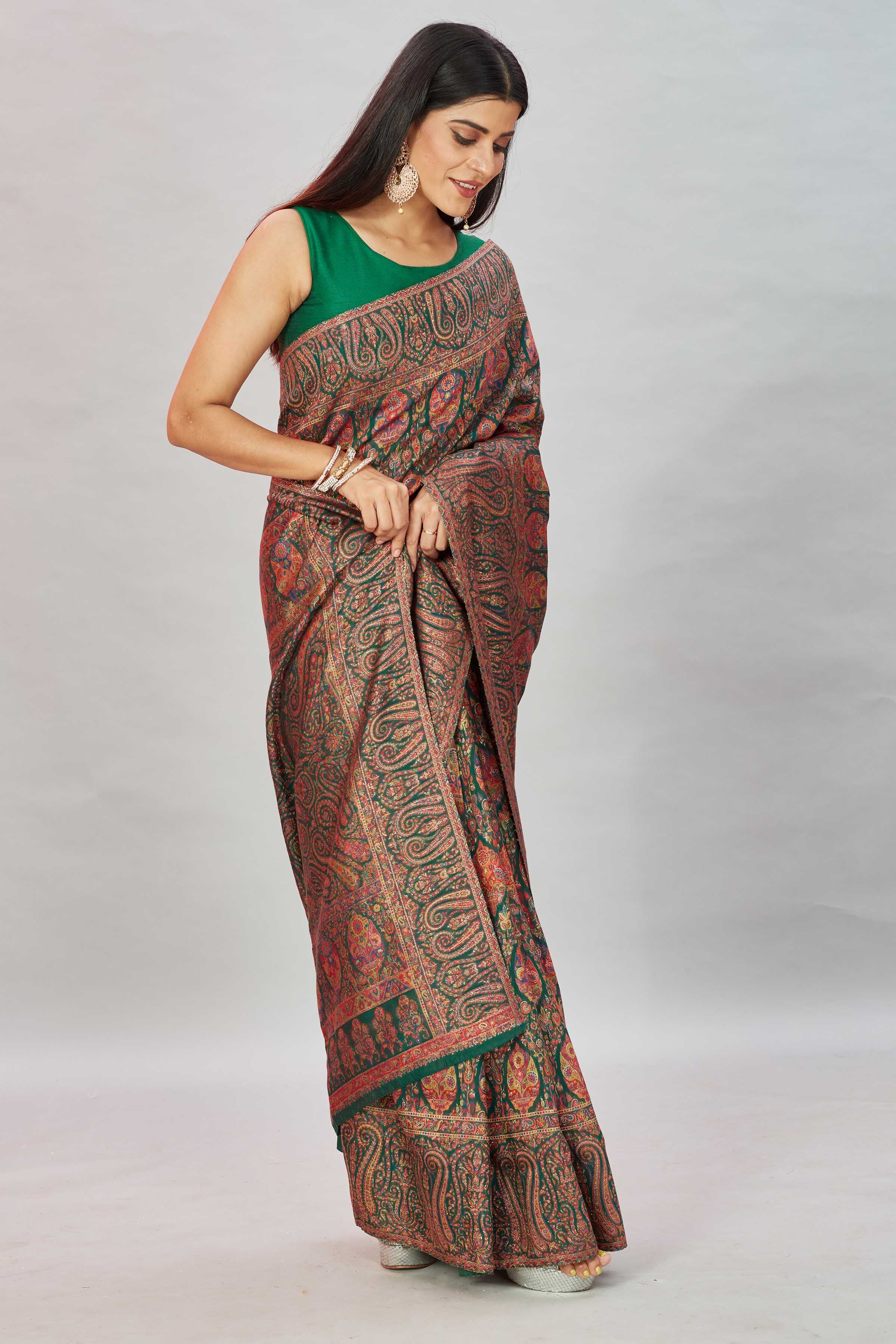 Shop stunning bottle green heavy Kani weave sari online in USA. Look your best on festive occasions in latest designer sarees, pure silk sarees, Kanjivaram silk sarees, handwoven sarees, tussar silk sarees, embroidered saris from Pure Elegance Indian clothing store in USA.-side