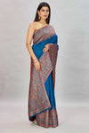 Shop stunning blue Kani weave border sari online in USA. Look your best on festive occasions in latest designer sarees, pure silk sarees, Kanjivaram silk sarees, handwoven saris, tussar silk sarees, embroidered saris from Pure Elegance Indian clothing store in USA.-full view