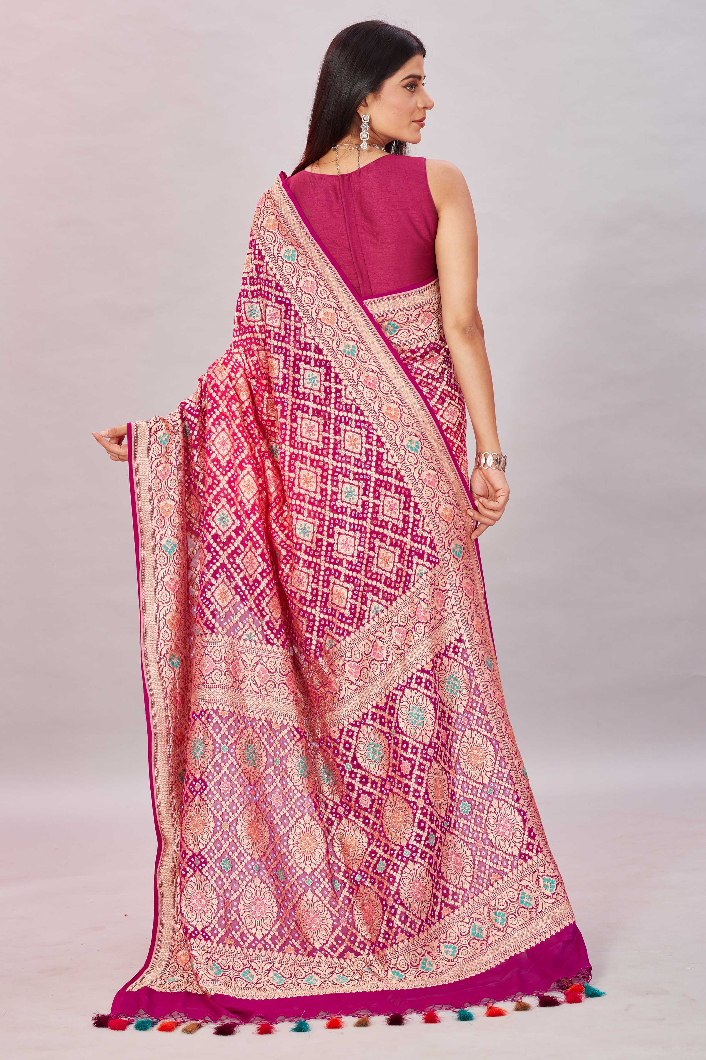 Buy beautiful ombre magenta georgette Banarasi saree online in USA with zari jaal. Look your best on festive occasions in latest designer sarees, pure silk sarees, Kanjivaram silk saris, handwoven saris, tussar silk sarees, embroidered saris from Pure Elegance Indian clothing store in USA.-back