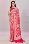 Buy beautiful rani pink georgette Banarasi saree online in USA with zari jaal. Look your best on festive occasions in latest designer sarees, pure silk sarees, Kanjivaram silk saris, handwoven saris, tussar silk sarees, embroidered saris from Pure Elegance Indian clothing store in USA.-full view