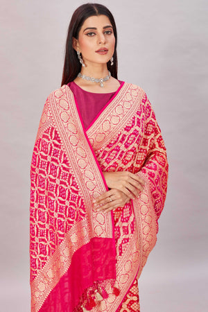 Shop beautiful ombre pink georgette Banarasi saree online in USA with zari jaal. Look your best on festive occasions in latest designer sarees, pure silk sarees, Kanjivaram silk saris, handwoven saris, tussar silk sarees, embroidered saris from Pure Elegance Indian clothing store in USA.-closeup