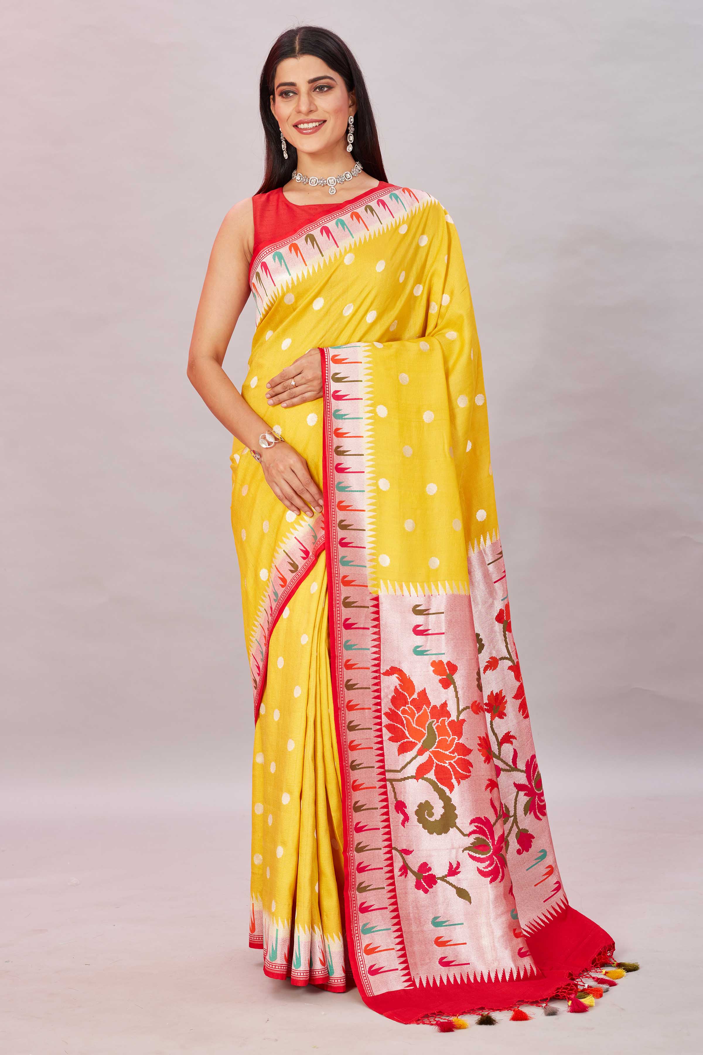 Shop yellow tussar Banarasi saree online in USA with Paithani border. Look your best on festive occasions in latest designer sarees, pure silk sarees, Kanjivaram silk sarees, handwoven saris, tussar silk sarees, embroidered saris from Pure Elegance Indian clothing store in USA.-full view