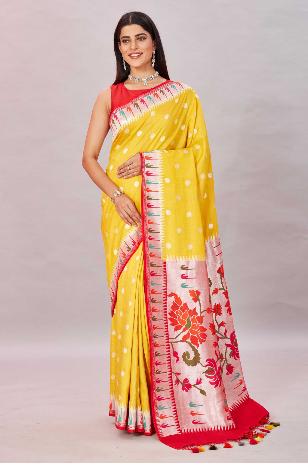 Shop yellow tussar Banarasi saree online in USA with Paithani border. Look your best on festive occasions in latest designer sarees, pure silk sarees, Kanjivaram silk sarees, handwoven saris, tussar silk sarees, embroidered saris from Pure Elegance Indian clothing store in USA.-full view