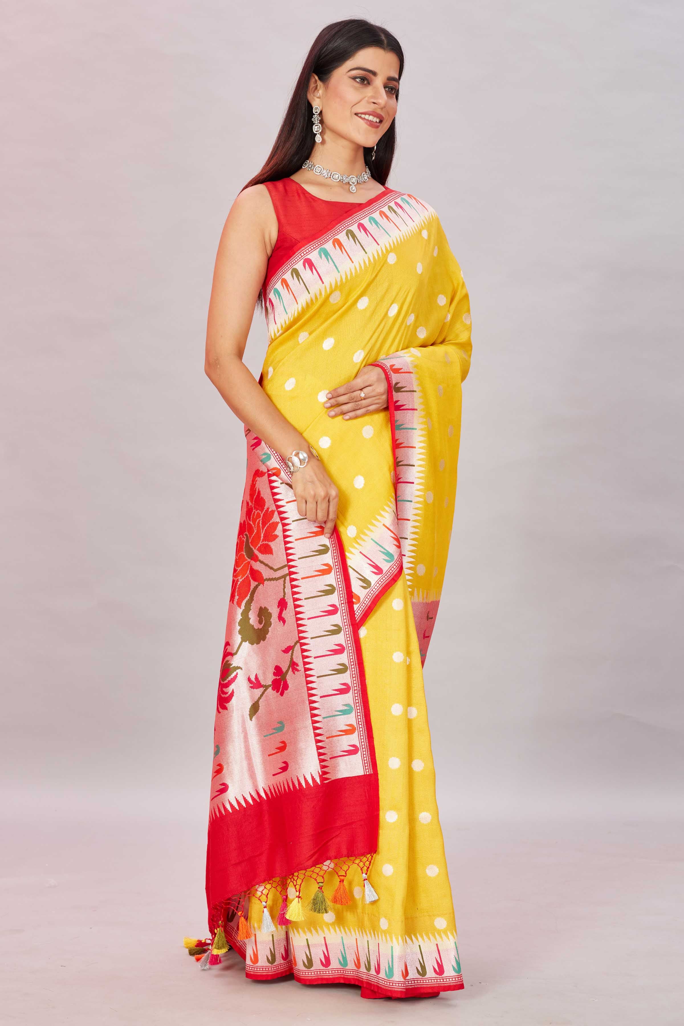 Shop yellow tussar Banarasi saree online in USA with Paithani border. Look your best on festive occasions in latest designer sarees, pure silk sarees, Kanjivaram silk sarees, handwoven saris, tussar silk sarees, embroidered saris from Pure Elegance Indian clothing store in USA.-side