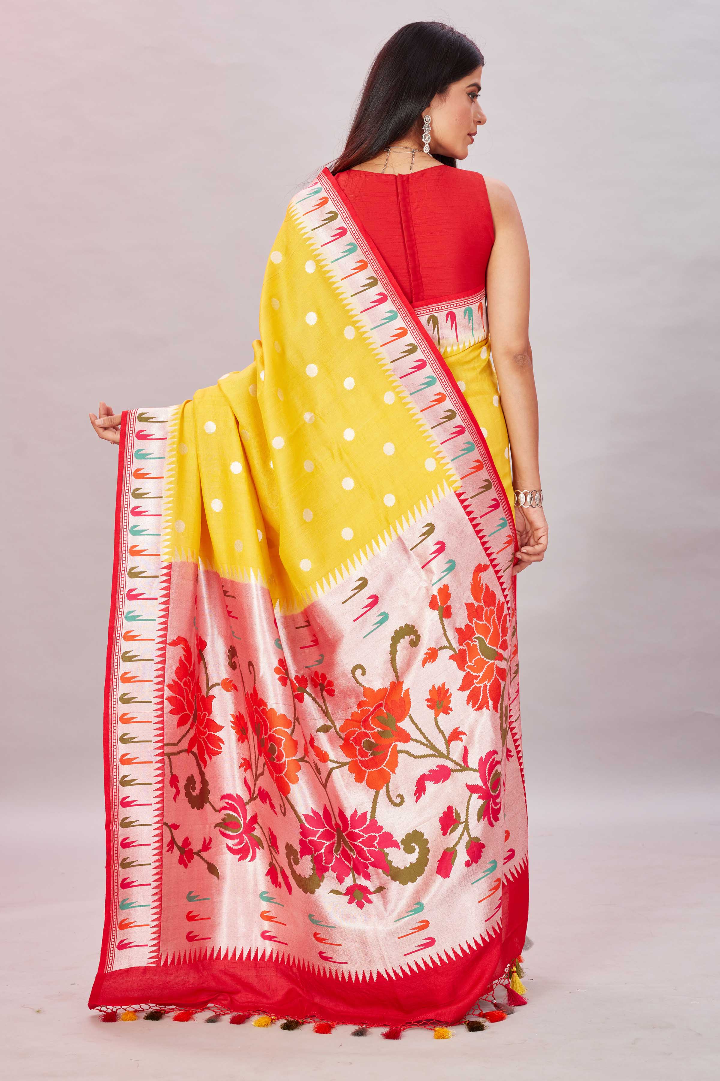 Shop yellow tussar Banarasi saree online in USA with Paithani border. Look your best on festive occasions in latest designer sarees, pure silk sarees, Kanjivaram silk sarees, handwoven saris, tussar silk sarees, embroidered saris from Pure Elegance Indian clothing store in USA.-back