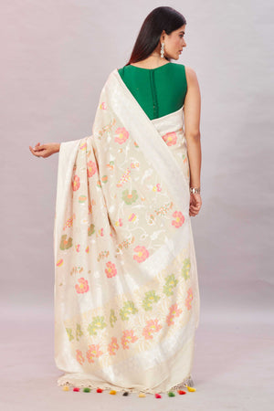 Shop cream tussar Banarasi saree online in USA with zari minakari floral jaal. Look your best on festive occasions in latest designer sarees, pure silk sarees, Kanjivaram silk sarees, handwoven saris, tussar silk sarees, embroidered saris from Pure Elegance Indian clothing store in USA.-back