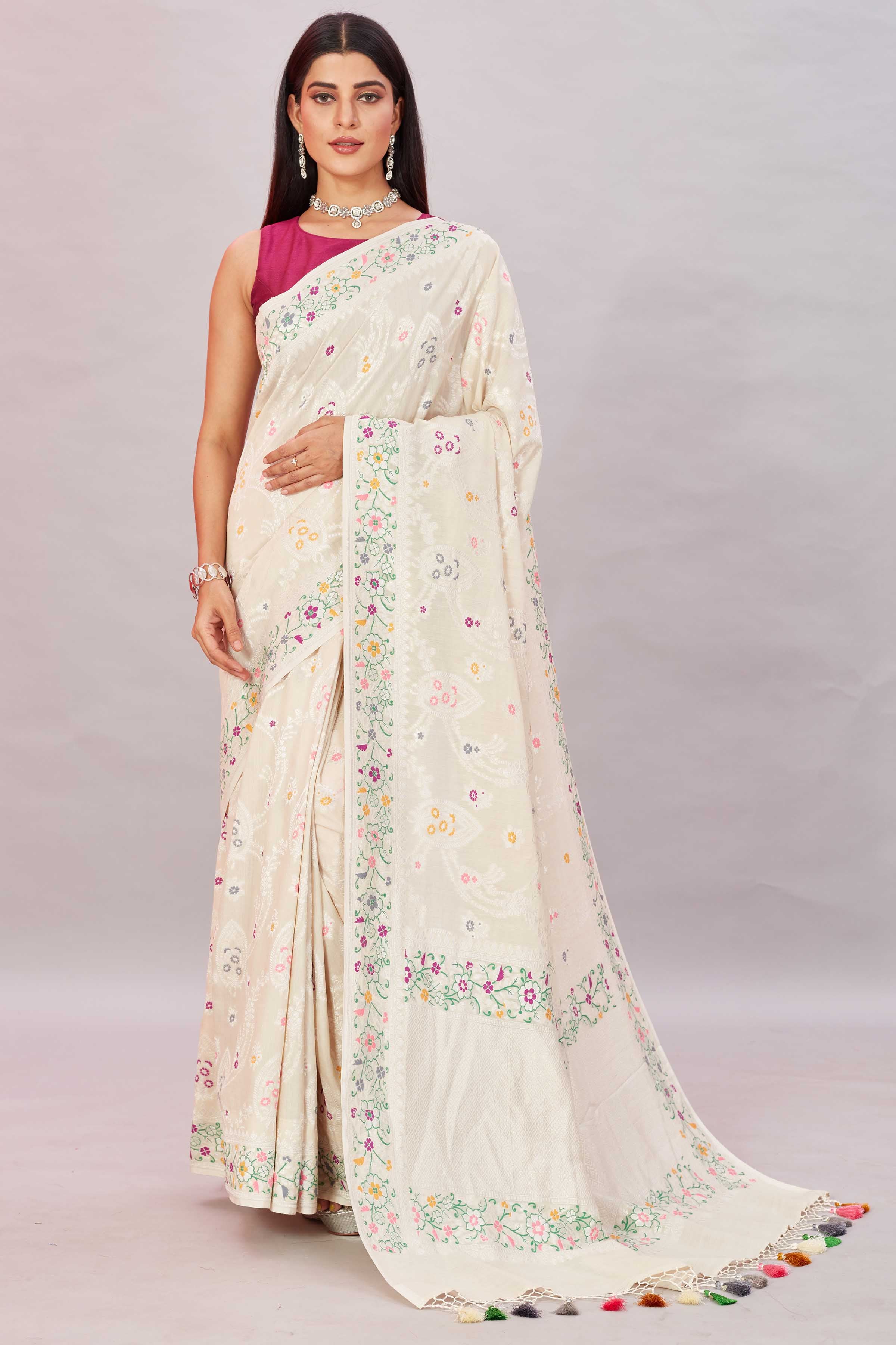 Buy cream tussar Banarasi saree online in USA with zari minakari border. Look your best on festive occasions in latest designer sarees, pure silk sarees, Kanjivaram silk sarees, handwoven saris, tussar silk sarees, embroidered saris from Pure Elegance Indian clothing store in USA.-full view