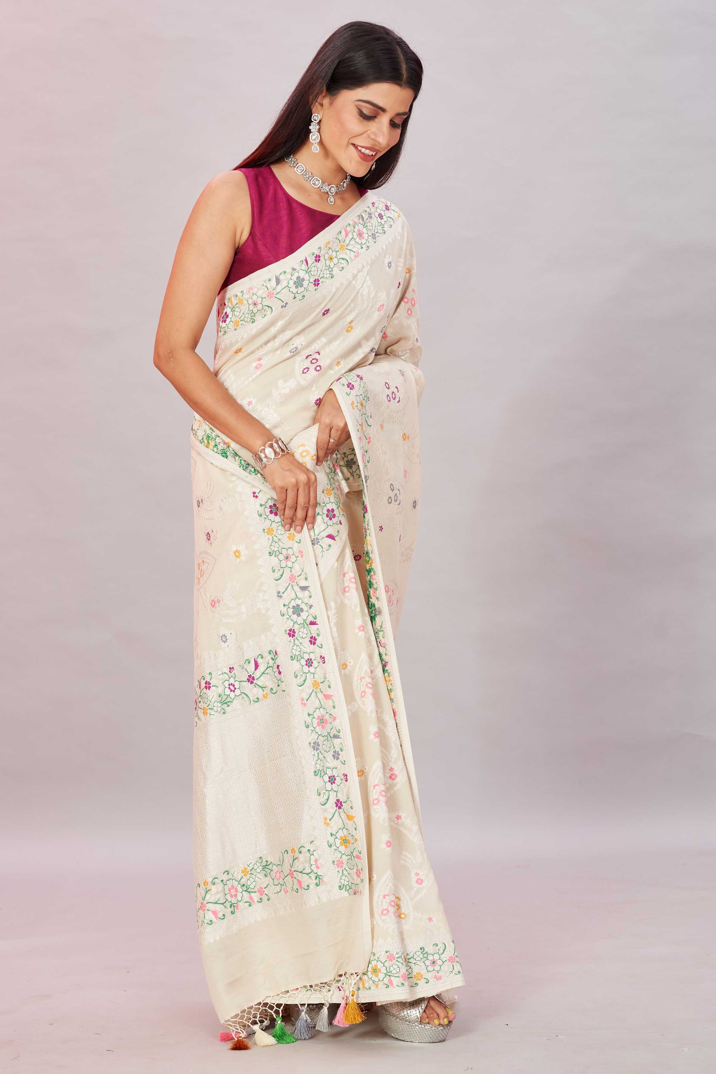 Buy cream tussar Banarasi saree online in USA with zari minakari border. Look your best on festive occasions in latest designer sarees, pure silk sarees, Kanjivaram silk sarees, handwoven saris, tussar silk sarees, embroidered saris from Pure Elegance Indian clothing store in USA.-side