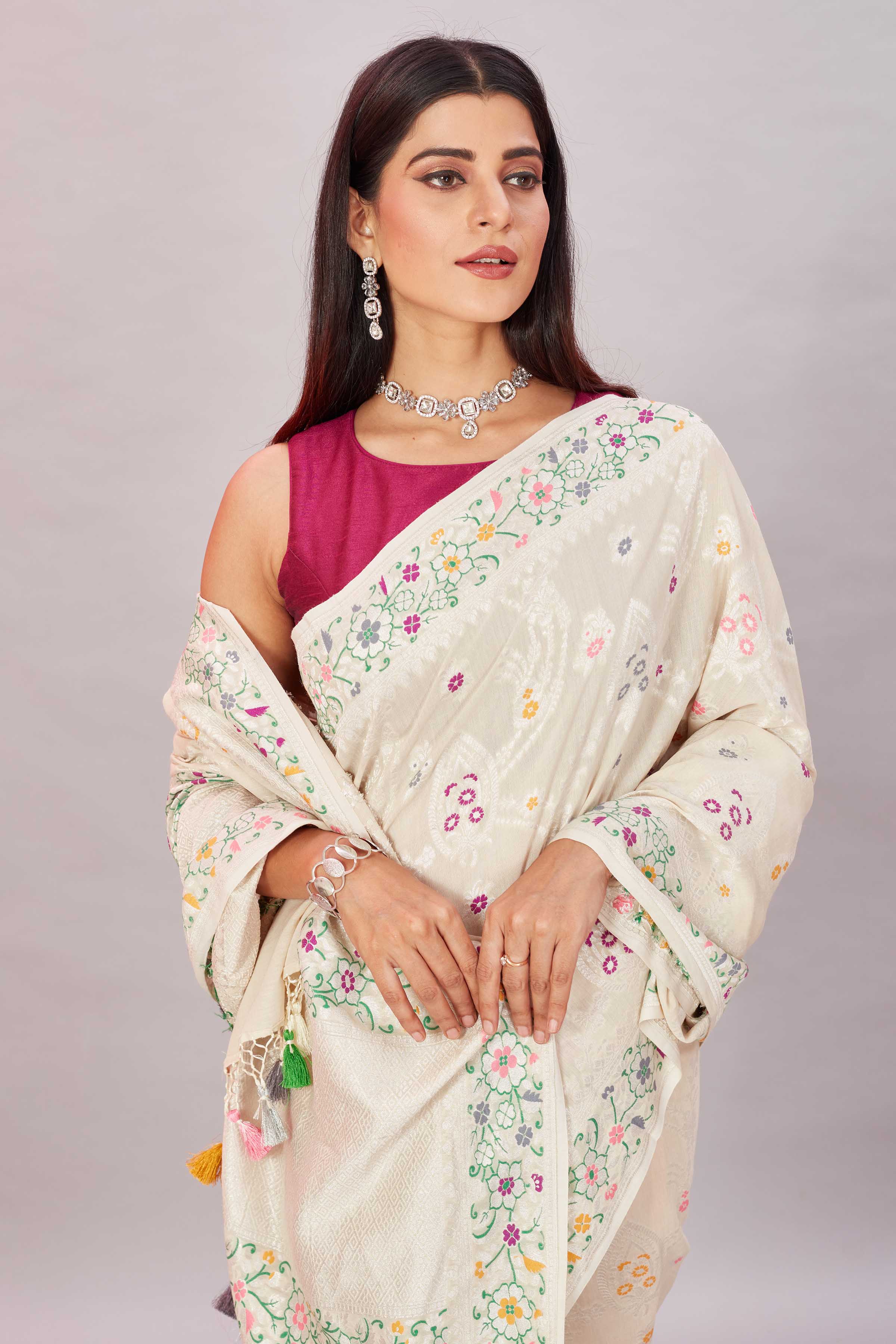 Buy cream tussar Banarasi saree online in USA with zari minakari border. Look your best on festive occasions in latest designer sarees, pure silk sarees, Kanjivaram silk sarees, handwoven saris, tussar silk sarees, embroidered saris from Pure Elegance Indian clothing store in USA.-closeup